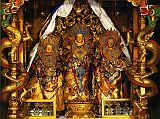 Tibet Lhasa 04 01 Potala Lokeshvara Sandalwood Statue The Potalas most sacred statue is the small, ancient and jewel-encrusted gilded sandalwood image of Arya Lokeshvara, the personal tutelary deity (yidam) of Songtsen Gampo. Flanking it are Tara and Avalokiteshvara, both made of white sandalwood. This is one of the few corners of the Potala that dates from the time of Songtsen Gampos 7th century palace. Since photography isn't allowed in the Potala Palace, I highly recommend the book Splendor of Tibet: The Potala Palace, Jewel of the Himalayas by Phuntsok Namgyalis, from which this photo was taken.